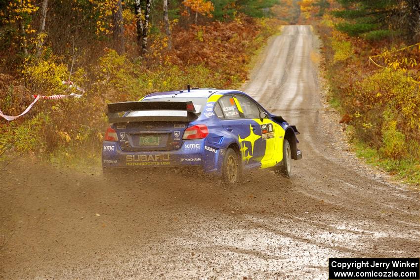 Travis Pastrana / Rhianon Gelsomino Subaru WRX STi on SS1, Passmore North I.