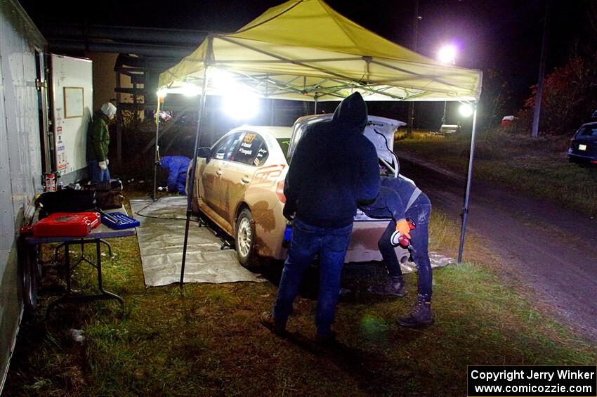 Jamey Randall / Geoff Youngdahl Subaru WRX at service in Sidnaw after day one.