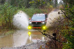 Chris Sladek / John Sharps Honda Passport on SS9, Nestoria-Herman.