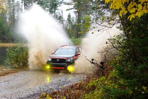 Chris Sladek / John Sharps Honda Passport on SS9, Nestoria-Herman.