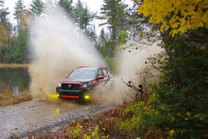 Chris Sladek / John Sharps Honda Passport on SS9, Nestoria-Herman.