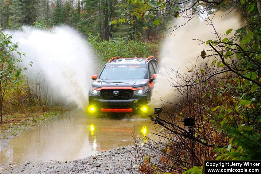 Chris Sladek / John Sharps Honda Passport on SS9, Nestoria-Herman.