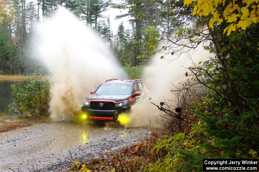 Chris Sladek / John Sharps Honda Passport on SS9, Nestoria-Herman.