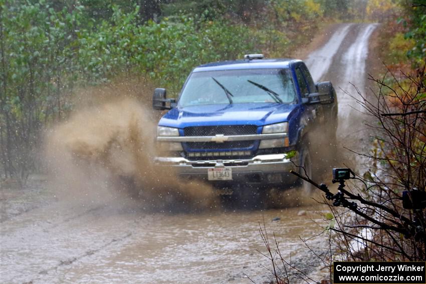 A Chevy Silverado pickup sweeps SS9, Nestoria-Herman.