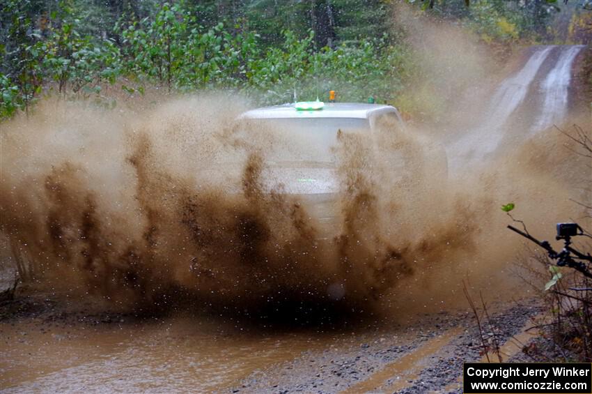 A GMC Sierra pickup sweeps SS9, Nestoria-Herman.