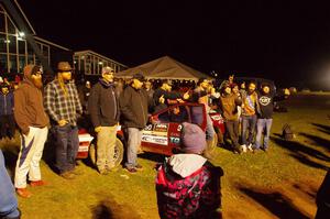 Former crew and co-drivers assemble next to the Al Dantes, Jr. Mazda RX-7 LS.