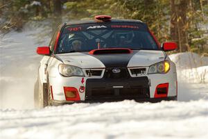 Jason Cook / Maggie Tu Subaru WRX on SS1.