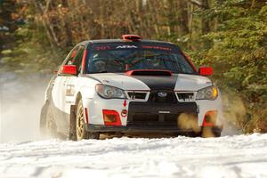 Jason Cook / Maggie Tu Subaru WRX on SS1.