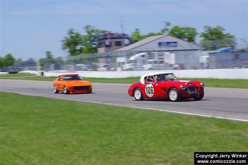 Scott McQueen's Austin-Healey 100-6 and Tim Homes' Datsun 240Z