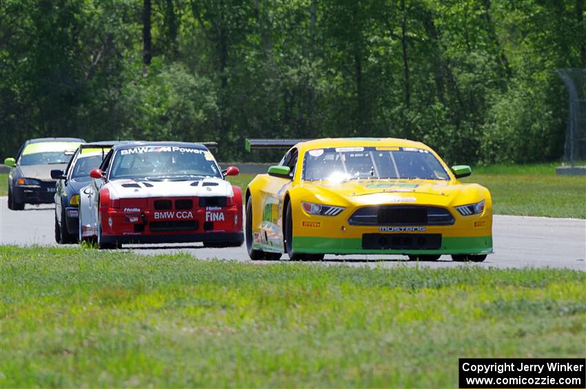 Matt Gray's GT-2 Ford Mustang, Mike Wagner's ITE-1 BMW M3 and Derek Wagner's T3 BMW 330