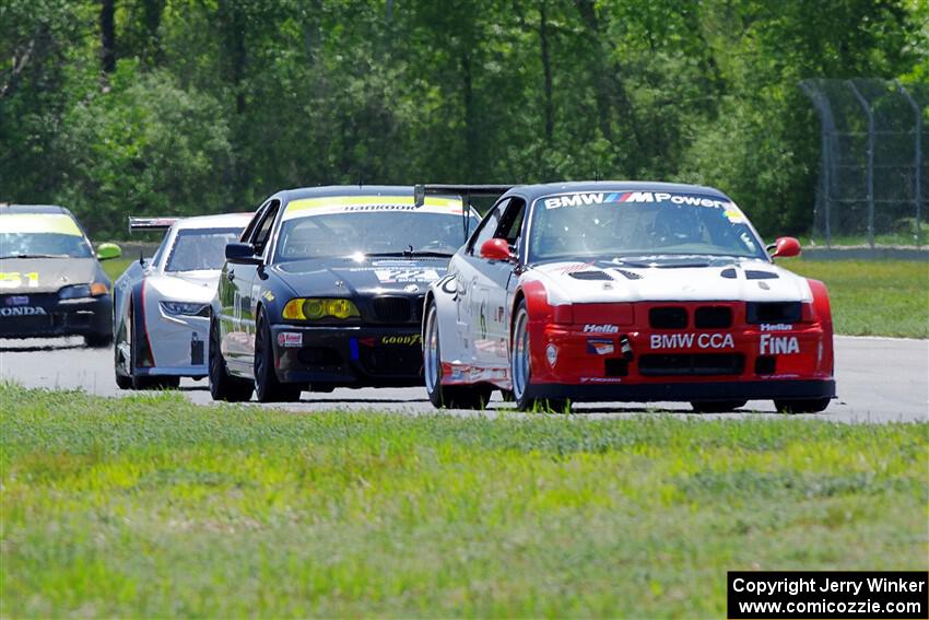 Mike Wagner's ITE-1 BMW M3, Derek Wagner's T3 BMW 330 and Justin Elder's GT-2 Chevy Camaro