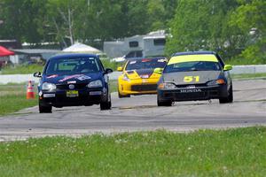 Tom Daly's STU VW Rabbit and Mark Utecht's ITE-2 Honda Civic