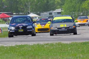 Tom Daly's STU VW Rabbit and Mark Utecht's ITE-2 Honda Civic