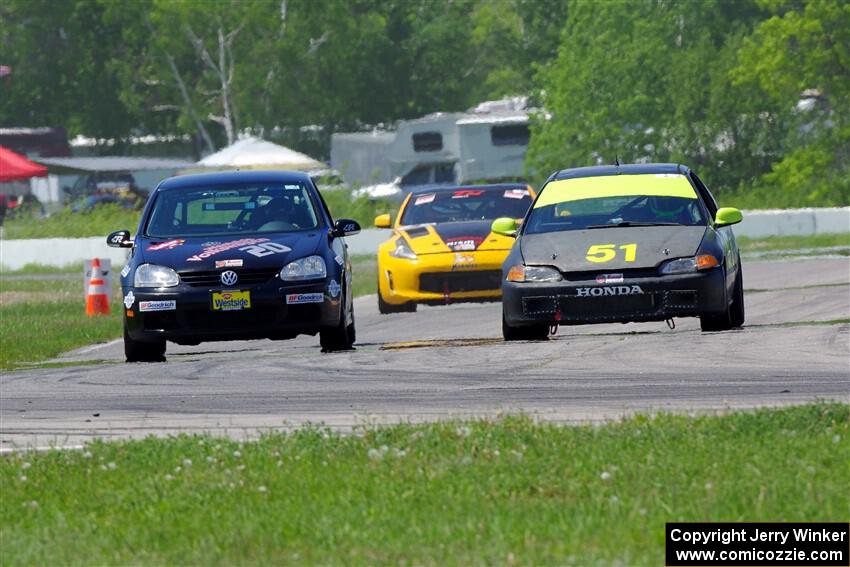 Tom Daly's STU VW Rabbit and Mark Utecht's ITE-2 Honda Civic