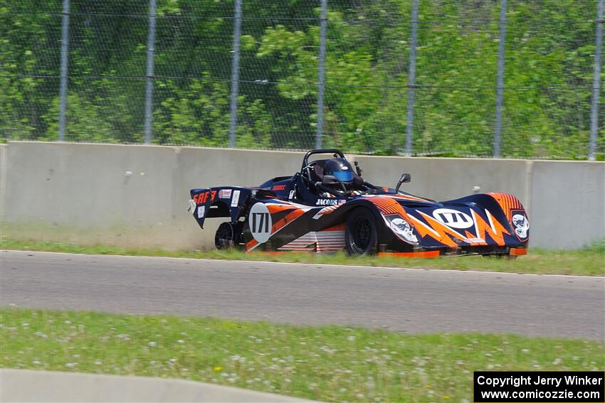 Ben Jacobs' Spec Racer Ford 3 slides against the turn 2 wall after an accident.