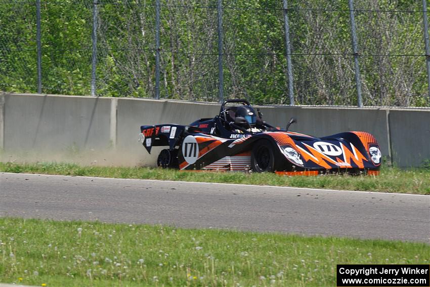 Ben Jacobs' Spec Racer Ford 3 slides against the turn 2 wall after an accident.