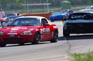 Andrew Jenkins' and Sam Nogosek's Spec Miata Mazda Miatas