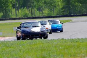 Geoff Youngdahl's, Dan Corgard's and Rick Buan's Spec Miata Mazda Miatas