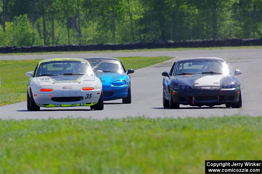 Geoff Youngdahl's, Dan Corgard's and Rick Buan's Spec Miata Mazda Miatas