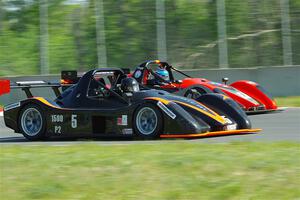 Martin Wiedenhoeft's P2 Radical SR3 RS 1500 passes Pius Eigenmann's P2 Radical SR3 RS 1500