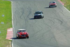 Scott McQueen's Austin-Healey 100-6, Jeff Johnk's BMW 325i and Erik Dieterle's BMW 2002