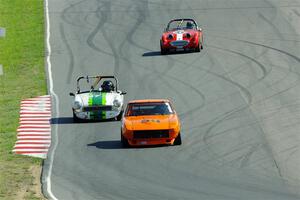 Tim Homes' Datsun 240Z, Steve Nichols' MGB and John Daniels, Jr.'s Austin-Healey Sprite