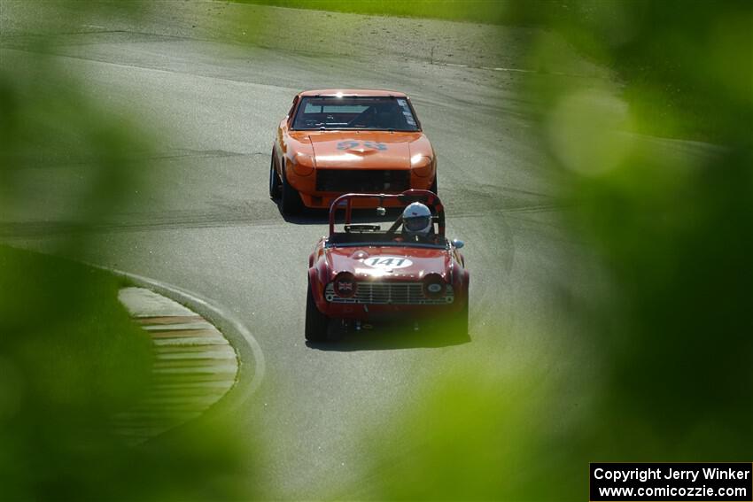 Greg Thompson's Triumph TR-4 and Tim Homes' Datsun 240Z