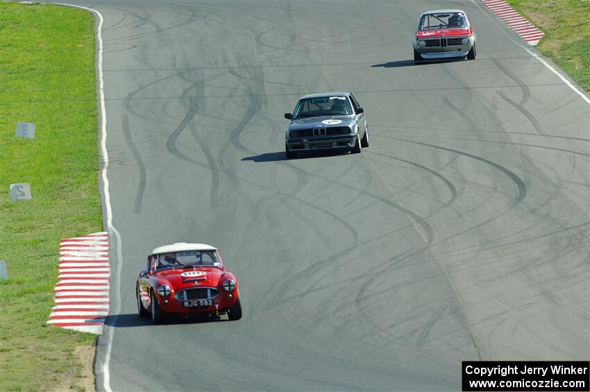 Scott McQueen's Austin-Healey 100-6, Jeff Johnk's BMW 325i and Erik Dieterle's BMW 2002