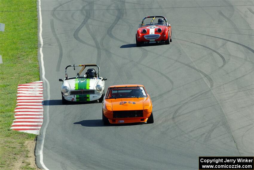 Tim Homes' Datsun 240Z, Steve Nichols' MGB and John Daniels, Jr.'s Austin-Healey Sprite