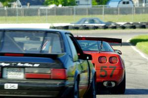 Tom Fuehrer's SPO Chevy Corvette and Dan Little's American Sedan Ford Mustang