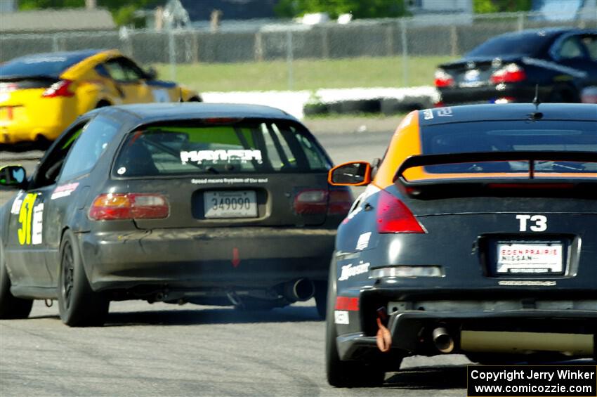 Mark Utecht's ITE-2 Honda Civic and Patrick Price's T3 Nissan 350Z