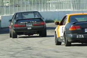 Dan Little's American Sedan Ford Mustang and Sam Fisher's ITA Nissan 200SX SE-R