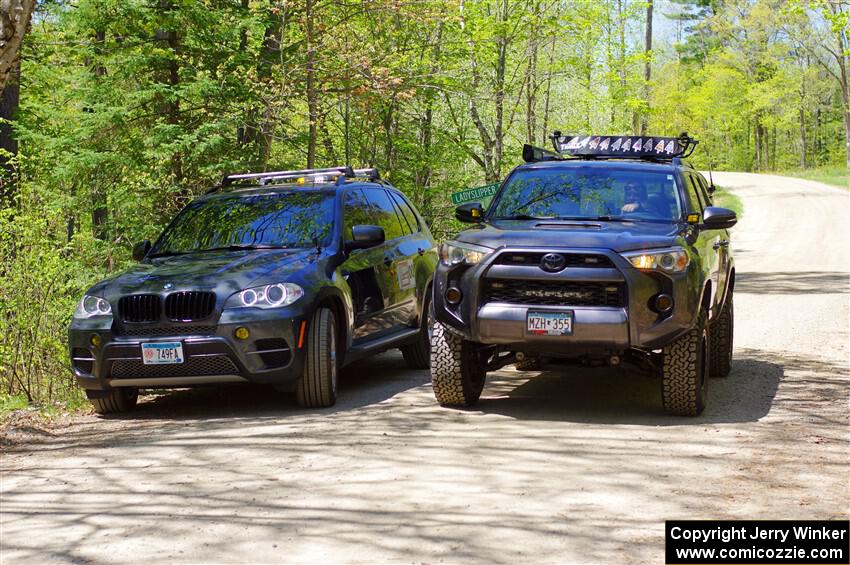 000 and 00 cars get ready to pre-check the stage.