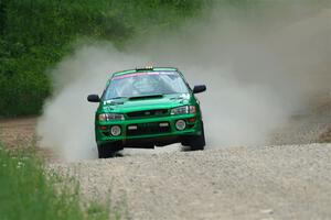 Jordan Locher / Tom Addison Subaru Impreza 2.5RS on SS1, Camp 3 North.