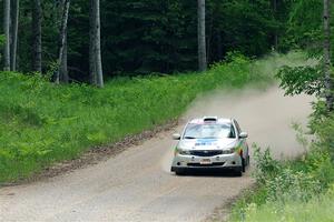 Sam Jacques / Trevor LaCombe Subaru Impreza on SS1, Camp 3 North.