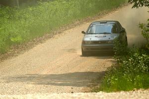 Dexter Clark / Jon McCallie Nissan Sentra SE-R on SS1, Camp 3 North.