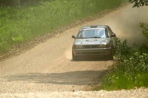 Dexter Clark / Jon McCallie Nissan Sentra SE-R on SS1, Camp 3 North.