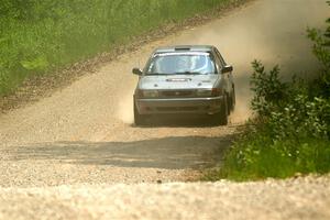 Dexter Clark / Jon McCallie Nissan Sentra SE-R on SS1, Camp 3 North.