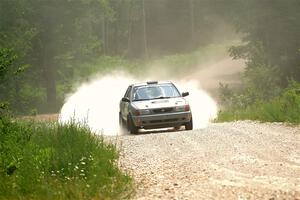 Dexter Clark / Jon McCallie Nissan Sentra SE-R on SS1, Camp 3 North.