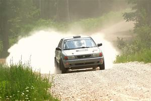 Dexter Clark / Jon McCallie Nissan Sentra SE-R on SS1, Camp 3 North.