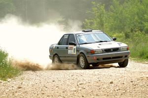 Dexter Clark / Jon McCallie Nissan Sentra SE-R on SS1, Camp 3 North.