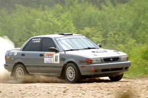 Dexter Clark / Jon McCallie Nissan Sentra SE-R on SS1, Camp 3 North.