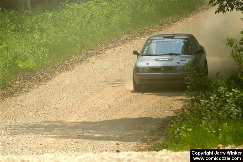 Dexter Clark / Jon McCallie Nissan Sentra SE-R on SS1, Camp 3 North.