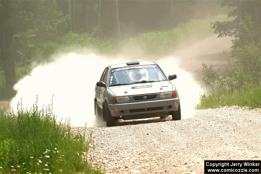 Dexter Clark / Jon McCallie Nissan Sentra SE-R on SS1, Camp 3 North.