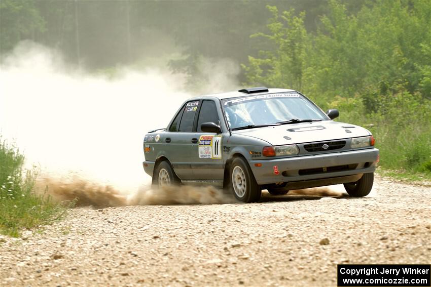 Dexter Clark / Jon McCallie Nissan Sentra SE-R on SS1, Camp 3 North.