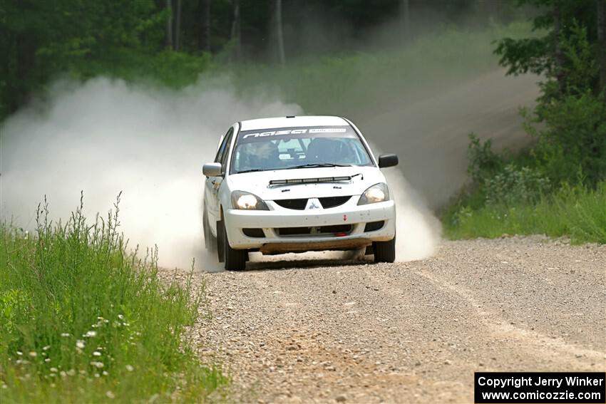 Andrew Bockheim / Salvatore LoPresti Mitsubishi Lancer on SS1, Camp 3 North.