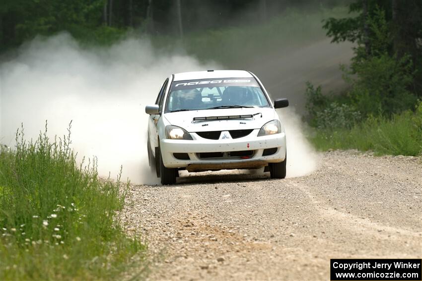 Andrew Bockheim / Salvatore LoPresti Mitsubishi Lancer on SS1, Camp 3 North.