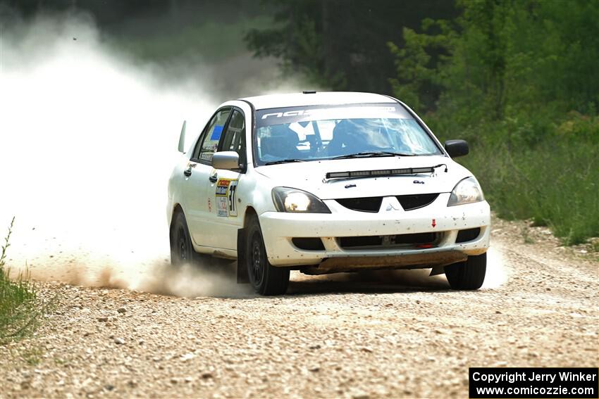 Andrew Bockheim / Salvatore LoPresti Mitsubishi Lancer on SS1, Camp 3 North.