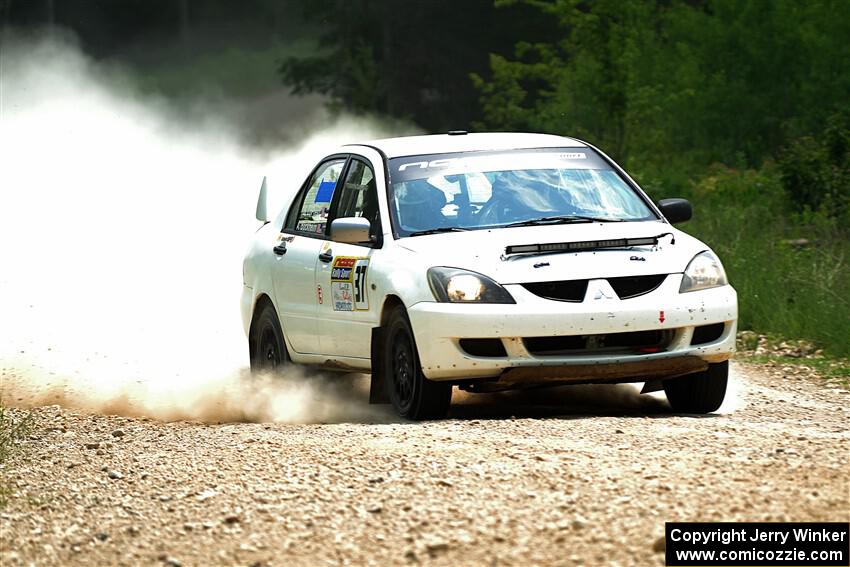 Andrew Bockheim / Salvatore LoPresti Mitsubishi Lancer on SS1, Camp 3 North.