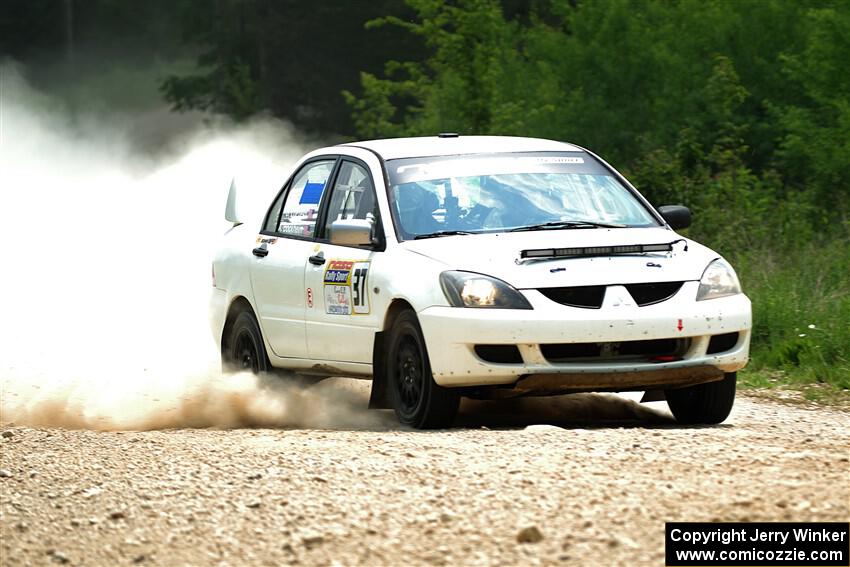 Andrew Bockheim / Salvatore LoPresti Mitsubishi Lancer on SS1, Camp 3 North.